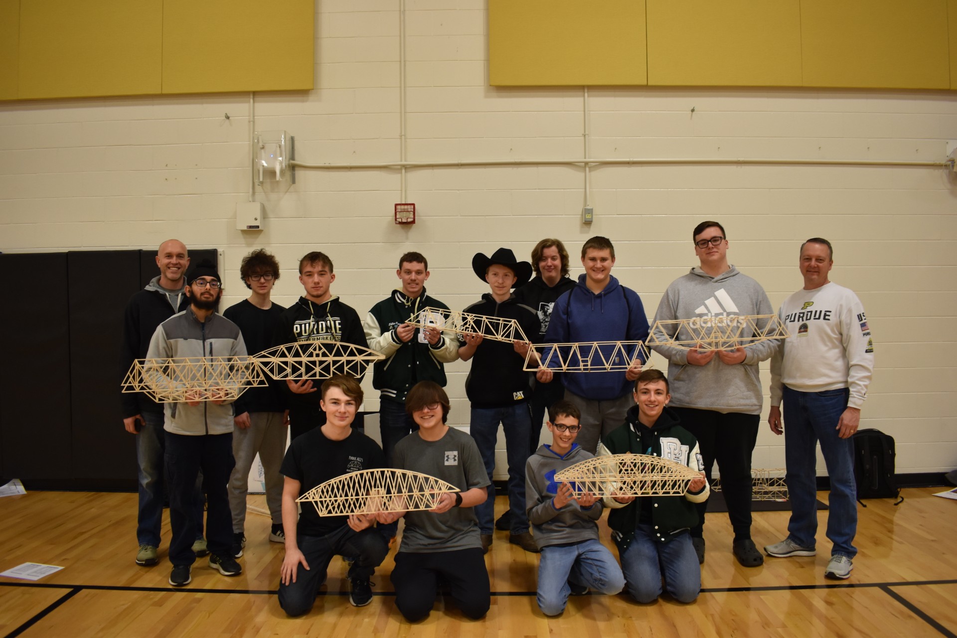 13 Contestants with their balsa wood bridges